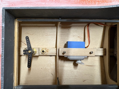 Servo retaining cap retained with small screws.