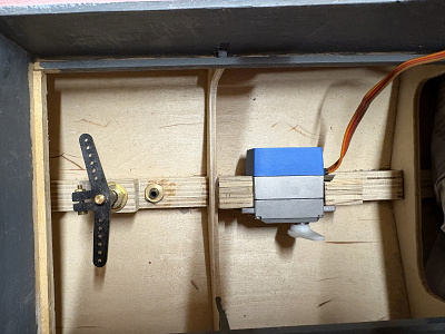 Heavy blocks mounted on keel to retain steering servo.